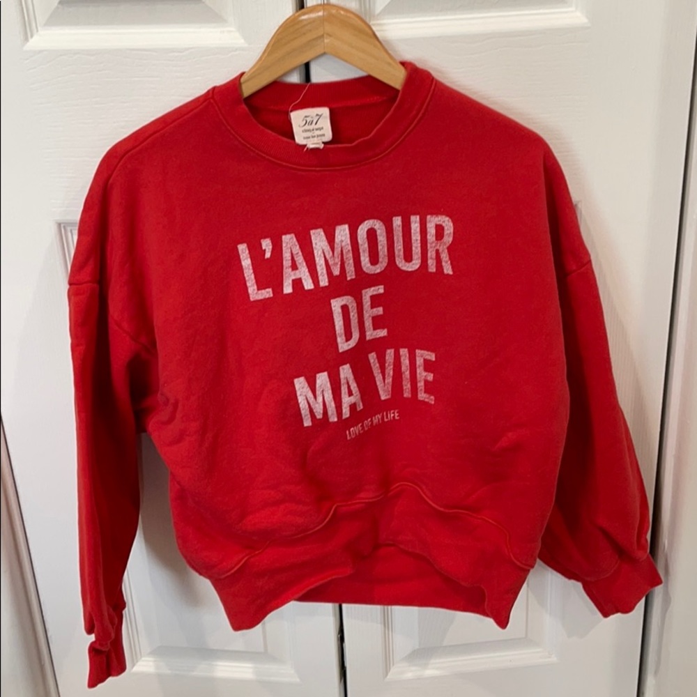 Red sweater from Neiman Marcus